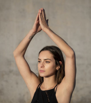 medium-shot-woman-yoga-pose